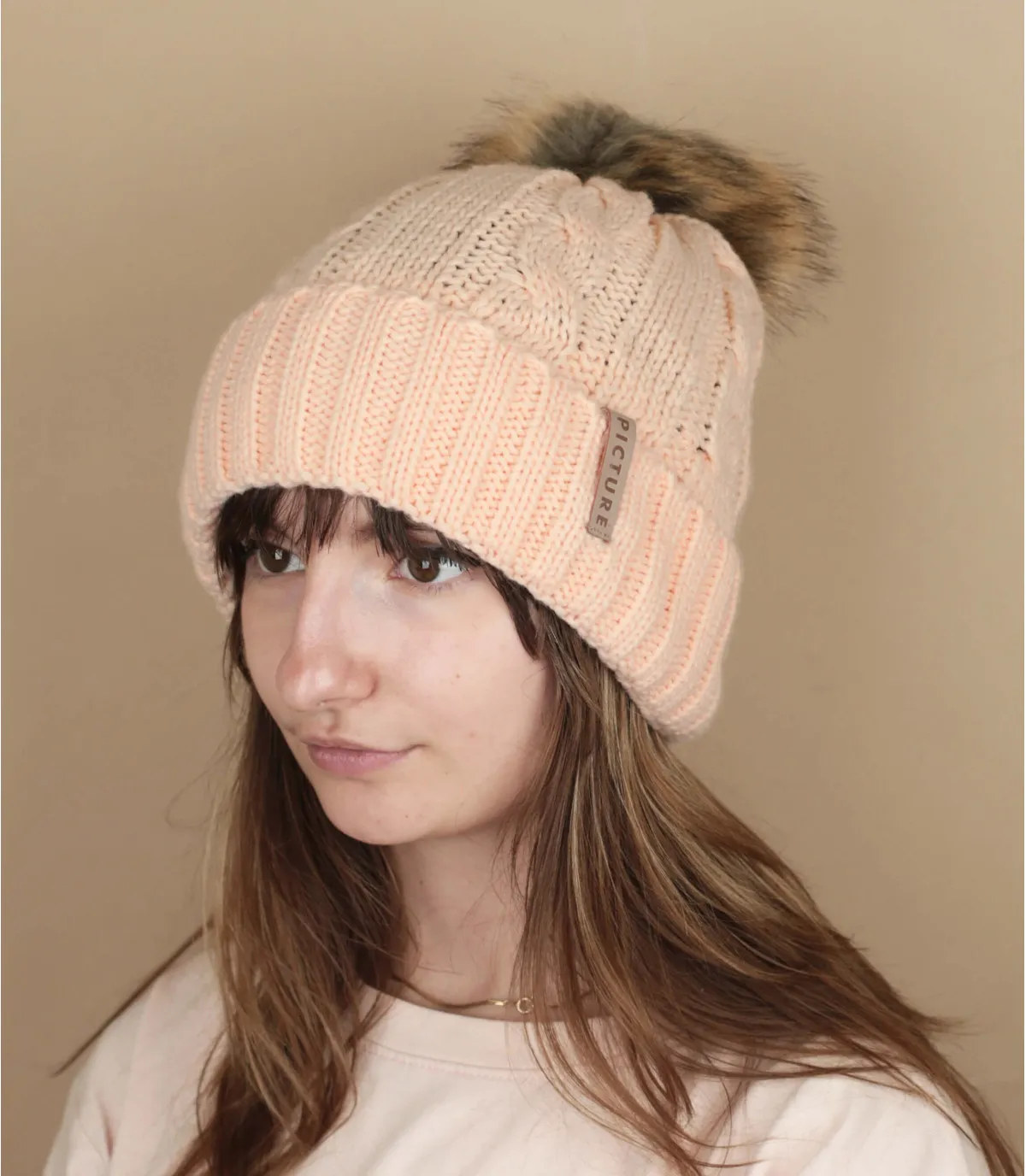 Berretto con pompon beige  Ezah cream     
