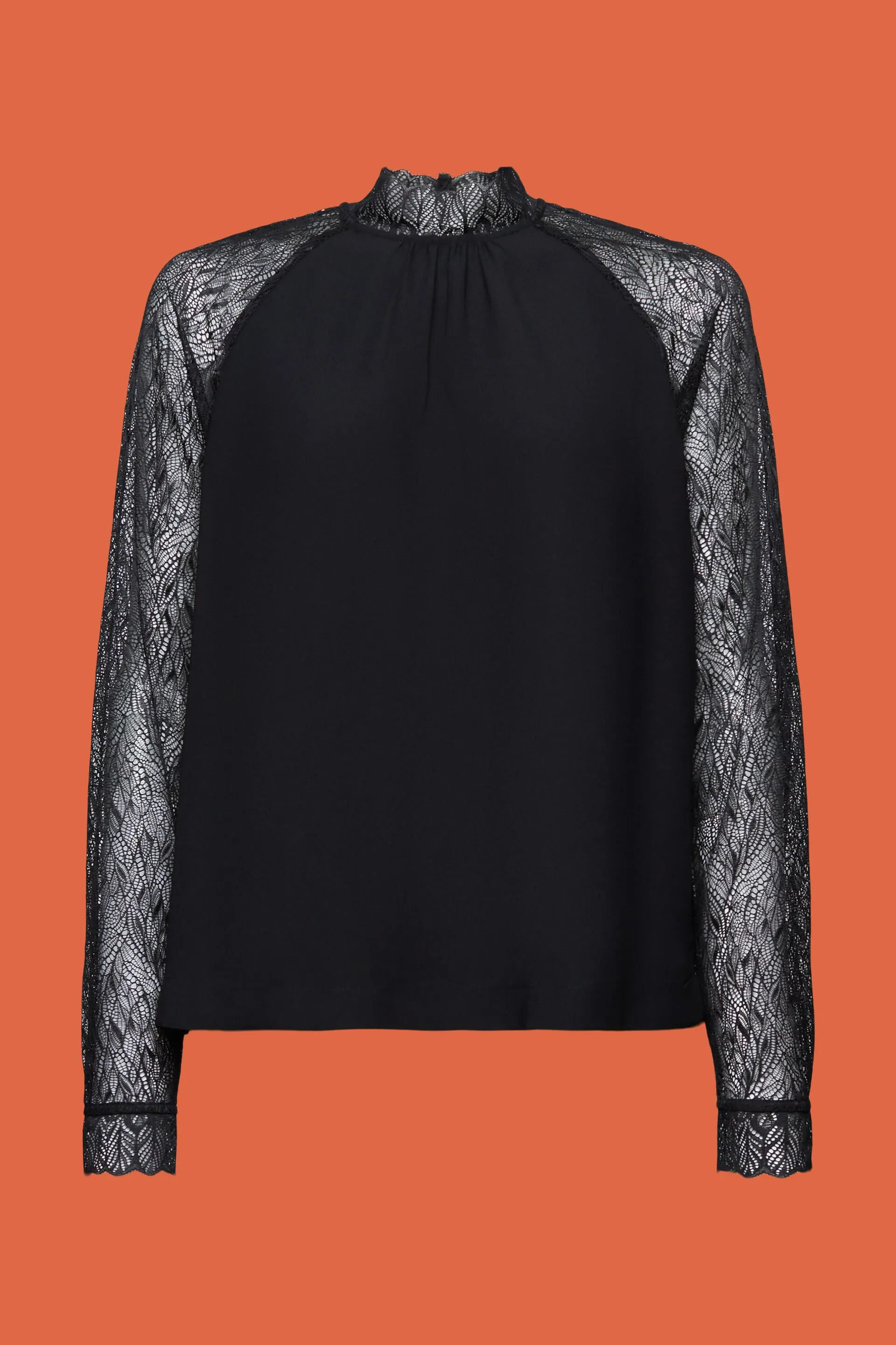 Blusa in pizzo a manica lunga