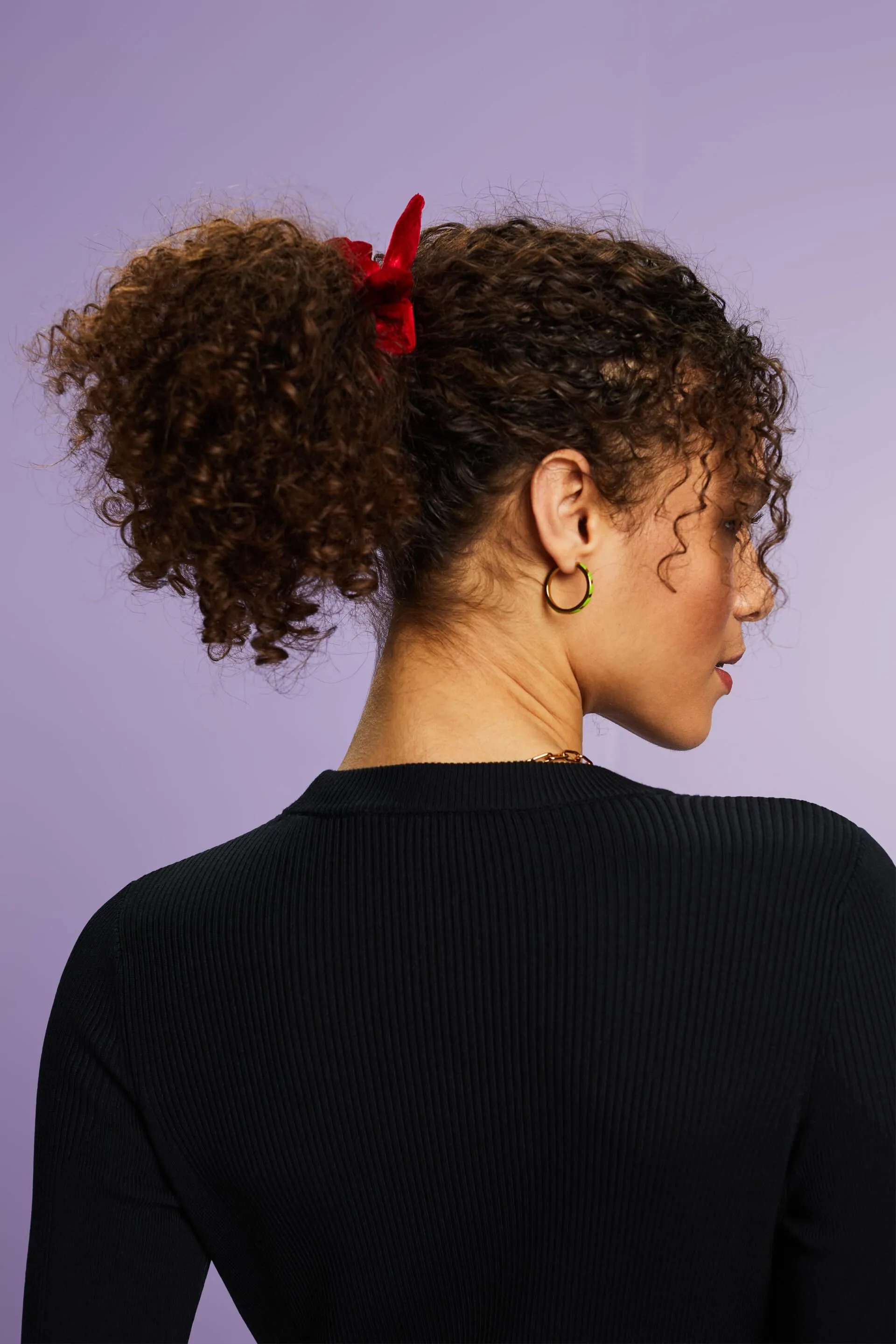 Elastico per capelli viola con fiocco